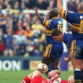 In the Challenge Cup 25 years ago, Barrie McDermott (number 10) pleads his innocence following a tackle on Wigan's Simon Haughton, but the red card was shown and Leeds Rhinos were down to 12 men. Picture by Steve Riding.