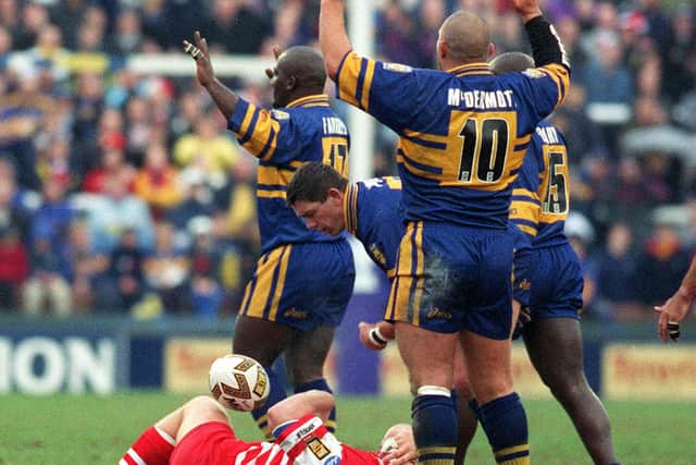 In the Challenge Cup 25 years ago, Barrie McDermott (number 10) pleads his innocence following a tackle on Wigan's Simon Haughton, but the red card was shown and Leeds Rhinos were down to 12 men. Picture by Steve Riding.