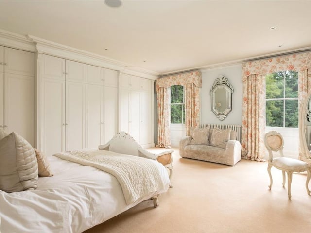 There are five good-sized double bedrooms, all with recently fitted en suite bath/shower rooms, in the main house with a one bedroomed self contained apartment to the rear.