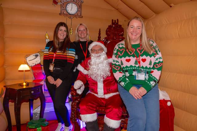 Staff from Caddick Construction Group (event sponsors) and Santa at the Child Friendly Leeds event.