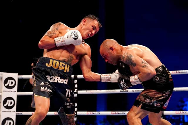 Josh Warrington, left, in action against Kiko Martinez during their IBF world featherweight title fight at the First Direct Arena, Leeds, last year. Picture by Martin Rickett/PA Wire.
