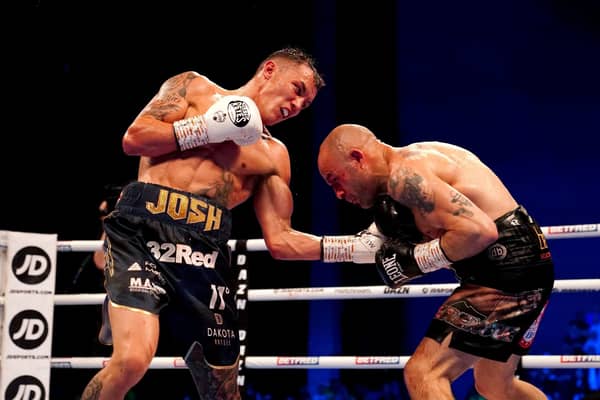 Josh Warrington, left, in action against Kiko Martinez during their IBF world featherweight title fight at the First Direct Arena, Leeds, last year. Picture by Martin Rickett/PA Wire.