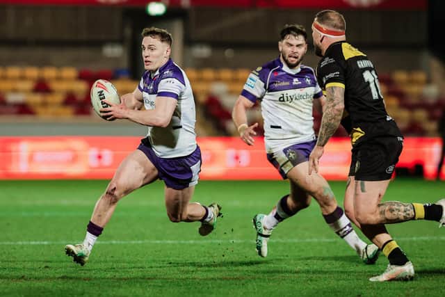 Jake Trueman on the attack for Wakefield Trinity during their win at York Knights. Picture by Alex Whitehead/SWpix.com.