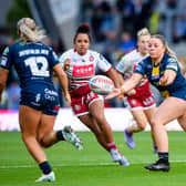 Leeds Rhinos' Ruby Bruce gets a pass away during last week's loss to Wigan Warriors. Picture by Allan McKenzie/SWpix.com.