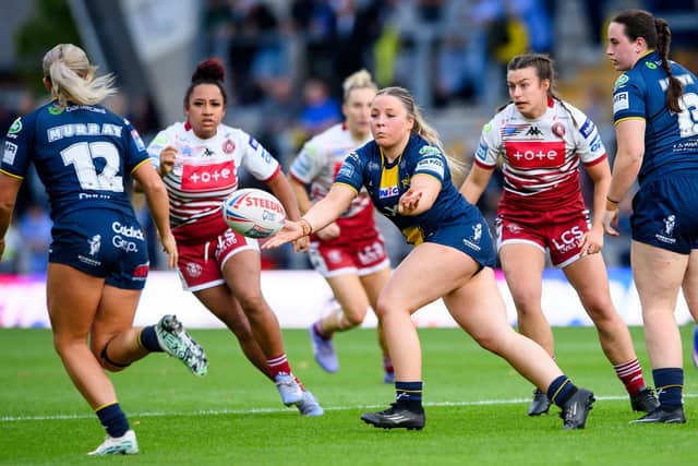 Leeds Rhinos' Ruby Bruce gets a pass away during last week's loss to Wigan Warriors. Picture by Allan McKenzie/SWpix.com.