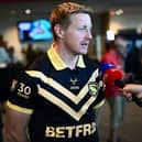Leeds Rhinos' Lachie Miller in his 2026 Dream Team kit during Monday's Super League play-offs launch at Old Trafford. Picture by Olly Hassell/SWpix.com.