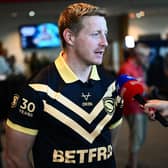 Leeds Rhinos' Lachie Miller in his 2026 Dream Team kit during Monday's Super League play-offs launch at Old Trafford. Picture by Olly Hassell/SWpix.com.