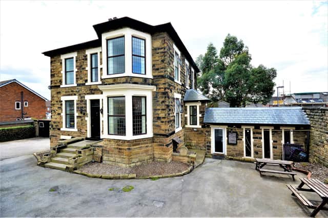 The detached Victorian property with garden, driveway and garage, is split over four floors.