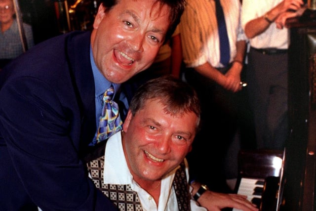 The winner of the 1996 Tetley G.U.L.P ( Great Universal Leeds Pub) Piano Competition was Clive Conlon (seated). He is pictured with entertainer Bobby Crush who was guest judge at the finals at the Victoria pub. The event was organised by Leeds Leisure Services and sponsored by Tetley's.