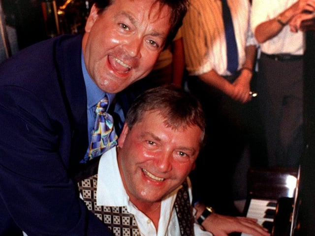 The winner of the 1996 Tetley G.U.L.P ( Great Universal Leeds Pub) Piano Competition was Clive Conlon (seated). He is pictured with entertainer Bobby Crush who was guest judge at the finals at the Victoria pub. The event was organised by Leeds Leisure Services and sponsored by Tetley's.
