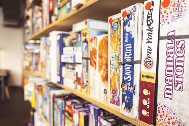 The cafés are centred around a library of more than 500 board games (Photo by Chance & Counters)