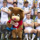 Little fan Elsie Payne, aged five, gives Children’s Heart Surgery Fund mascot Katie Bear a cuddle during Leeds Rhinos' photocall at AMT Headingley. Picture by Simon Hulme