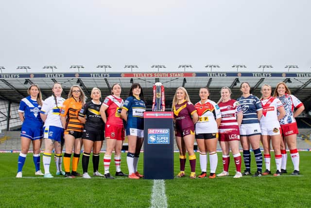 Betfred Women's Super League was launched at Headingley on Tuesday. Left to Right - Barrow's Michelle Larkin, Warrington's Armani Sharrock, Castleford's Kaitlin Varley, York's Sinead Peach, Salford's Louise Fellingham, Leeds' Hanna Butcher, Huddersfield's Bella Sykes,  Bradford's Jess Harrop, Wigan's Rachel Thompson, Featherstone's Danielle Waters, St Helens' Jodie Cunningham and Leigh's Mairead Quinn. Picture by Allan McKenzie/SWpix.com.