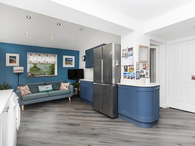 A section of the spacious open plan kitchen and living arrangement.