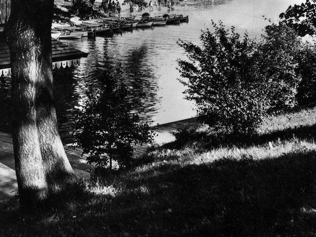 A postcard view showing Waterloo Lake at Roundhay Park. A date of August 5, 1938 is written on the back.