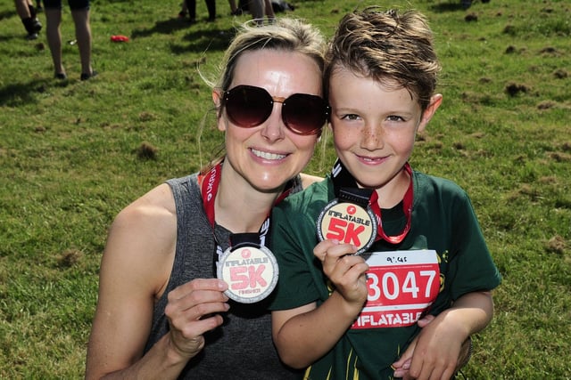Claire Munroe and son Elis, six, from Wetherby, picked up some shiny new medals after their superb effort.