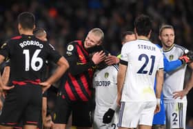 FRIENDLY FIRE - Willy Gnonto had his fair share of battles in Leeds United's defeat to Manchester City, but he also had a cuddle with Whites enthusiast Erling Haaland. Pic: Getty