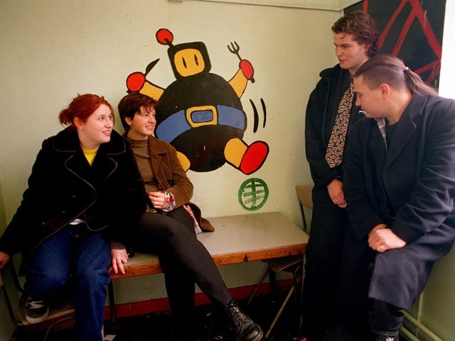 The student's smoke room at New College showing one of the murals by Elliot Mosedale in November 1997. Pictured are, from left, students Ruth Seals, Maddi Ellis, Toby Green and Matthew Wheeler.