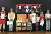 Collingham Lady Hastings pupils with their letters to Buckingham Palace which they wrote to mark the King's Coronation.