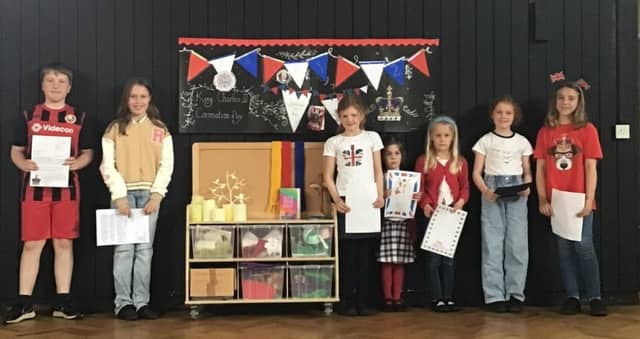 Collingham Lady Hastings pupils with their letters to Buckingham Palace which they wrote to mark the King's Coronation.
