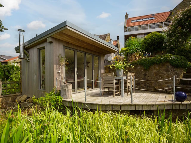 Dine al fresco on one of the decked areas or terraces, or take shelter within this garden room.