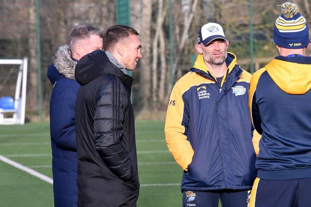 Kevin Sinfield (black coat) chats to coach Rohan Smith at Rhinos' Kirkstall training base today (Thursday). Picture by Simon Hulme.