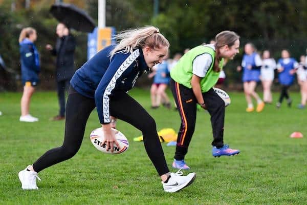 England International Caitlin Beevers takes part in a Three Lions Week session with Dewsbury Moor youngsters at Leeds Rhinos' Kirkstall training base. Picture by Will Palmer/SWpix.com.