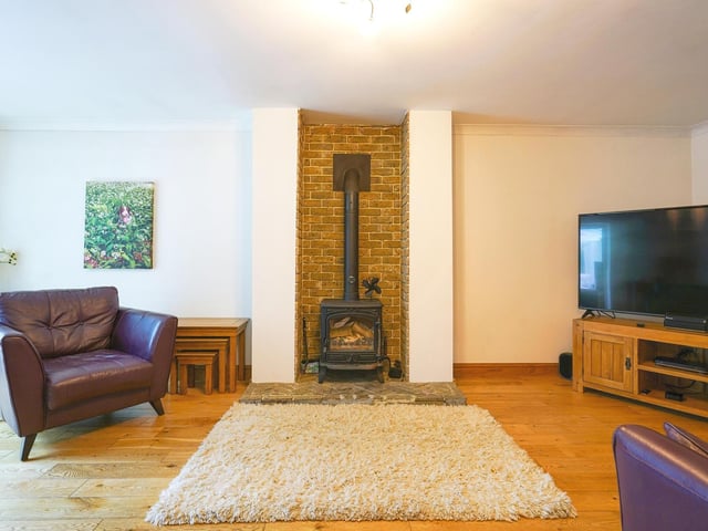 The ground floor includes a bright and airy dining room, a family lounge with a log burner, a lovely conservatory and a downstairs toilet.
