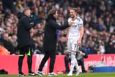 EXCHANGING PLEASANTRIES - Leeds United defender Luke Ayling had a number of conversations with Brentford staff and players on the bench during the firs thalf of the 0-0 draw at Elland Road. Pic: Getty