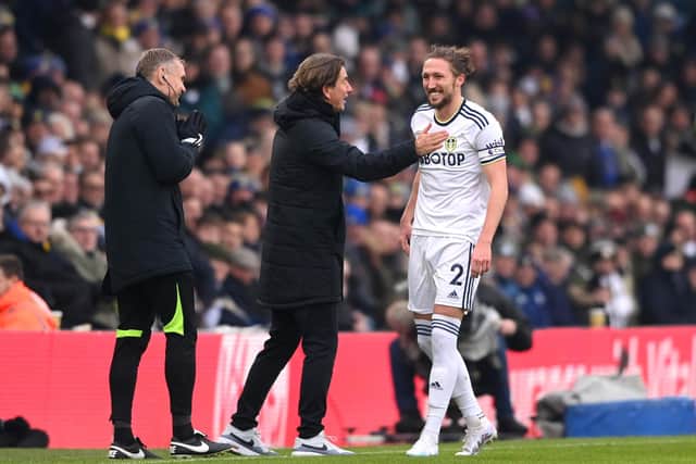 EXCHANGING PLEASANTRIES - Leeds United defender Luke Ayling had a number of conversations with Brentford staff and players on the bench during the firs thalf of the 0-0 draw at Elland Road. Pic: Getty