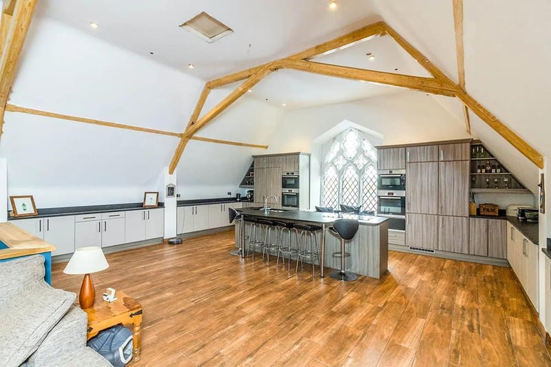 A highly specified, professional standard kitchen, says the brochure. "From the piped, underfloor heated wood effect flooring to the Riverwash granite worktops it's top quality throughout. Fitted with two conventional ovens, microwave, steam oven and induction hob it's a dream of a kitchen."