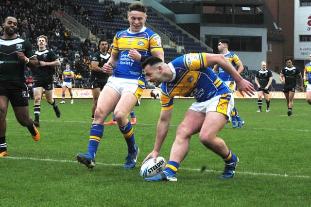 Jake Connor scores for Leeds Rhinos against Wests Warriors in the Challenge Cup third round last February. Picture by Steve Riding.