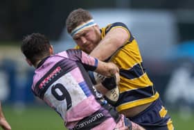 Leeds Tykes Will Dennis shrugs away Dings Tom Knight. Tykes have won four of their last six as they get to grips with National One (Picture: Tony Johnson)