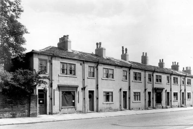 Two shops on Armley Town Street in July 1960. They are a confectioners, the business of Evelyn Dunn and seen towards the right is Amy Welborn's woollen drapers.