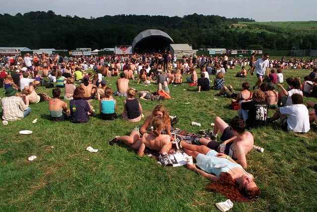 The sun and the music. Revellers take it easy on the festival site.