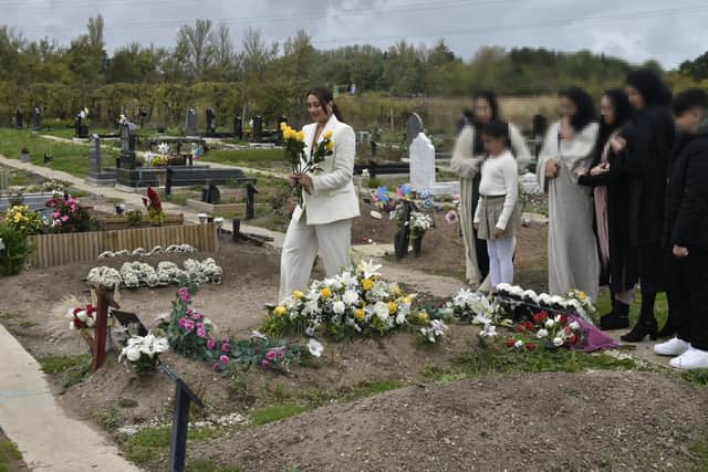 The seven children of Abida Karim held a touching memorial service for their mum at Whinmoor Cemetery (Photo: Steve Riding)