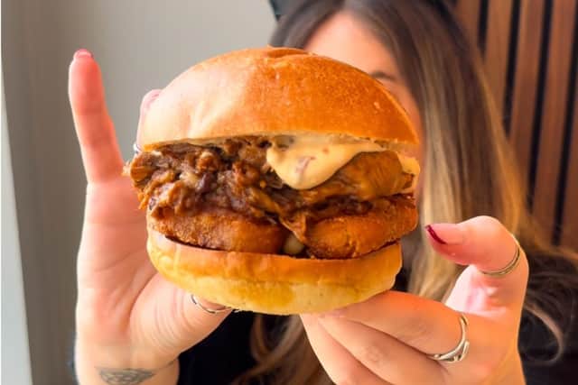 Victoria enjoying a burger at Thirty Nine Bakehouse in Ilkley. (Pic credit: Victoria James / @exploredineyorkshire)