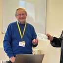 Yorkshire Air Ambulance volunteer Mike Bevington received a cheque for £200 from the Oddfellows,