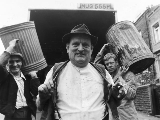 Lambert Alderson is pictured seen with his colleagues Arnold Beck, left, and Marc Symes, right, after winning a £50 bonus from Craven District Council for the care he had taken collecting rubbish. Pictured in August 1980.