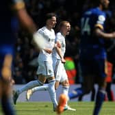 ALL SQUARE: Rasmus Kristensen celebrates putting Leeds United back level. Photo by LINDSEY PARNABY/AFP via Getty Images.