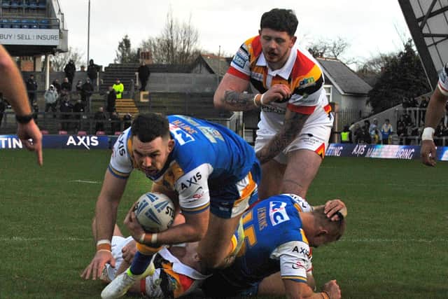 Cameron Smith scores for Leeds Rhinos in his testimonial game against Bradford Bulls last Saturday. Picture by Steve Riding.