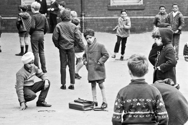 Children playing in the playground of Queen's Road County Primary School. The name was changed to Royal Park Middle School around 1972 when the three tier system was introduced. The school is located in Queen's Road between the junctions of Royal Park Road and Holderness View.