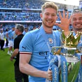 WHITES MESSAGE: From ex-Leeds United star Kalvin Phillips, right, pictured with Kevin De Bruyne with the Premier League trophy for newly-crowned champions Manchester City after Sunday's 1-0 win against Chelsea at the Etihad. Photo by Michael Regan/Getty Images.