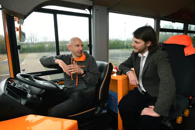 Bus driver trainer Andy Price shows YEP reporter Charles Gray the ropes at a bus driver experience day in Leeds. Photo: Jonathan Gawthorpe