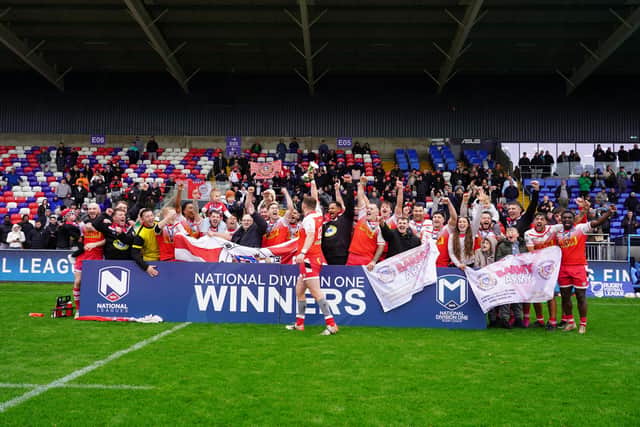East Leeds celebrate promotion to the National League Premier Division after beating Oulton Raiders in the promotion final. Picture by Jasper Liddy.