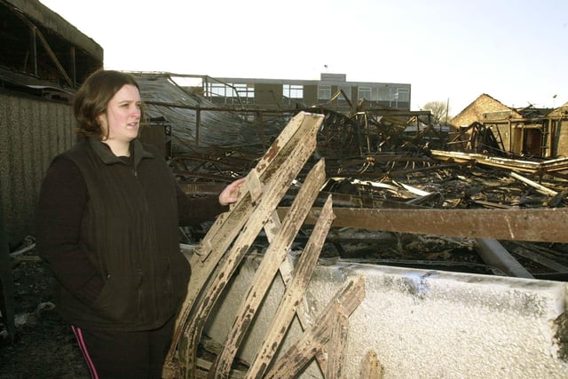 Gemma Woffinden, Head of Drama, observed the tangled metal and wreckage that remained of the sports hall, two gymnasiums and changing facilities following a fire at Brigshaw High School, Great Preston.