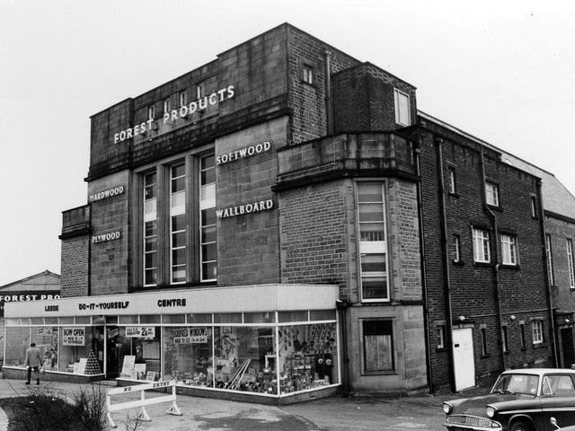 Bramley landmark Forest Products with signs for the sale of hardwood, softwood, plywood and wallboard. It was previously the  1,300 seat Clifton Cinema which opened in January 1939 and closed in  June 1961 with Carry On Regardless starring Sid James and Liz Frazer the last film to be screened.