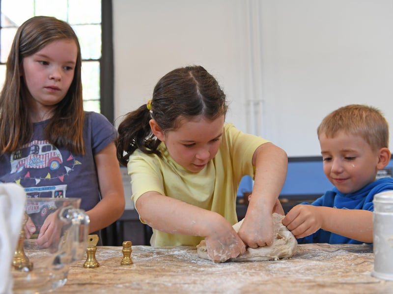 Children enjoy making bread and porridge in the kitchen at Ripon Workhouse Museum after its reopening following a £2.8m renovation. (Picture Gerard Binks)