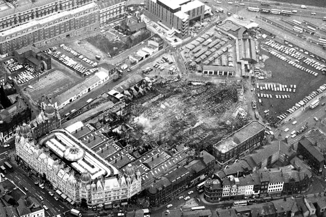 An aerial view looking across the destruction caused by a fire in Kirkgate Market, seen in the direction of the Eastgate roundabout in December 1975. Around four acres of the site was destroyed in a blaze which took 110 fireman two hours to control. Most of the 1857 section of the market was destroyed although the 1904 frontage onto Vicar Lane was saved.