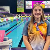 Lily Firm is working as a lifeguard at the Commonwealth Games.